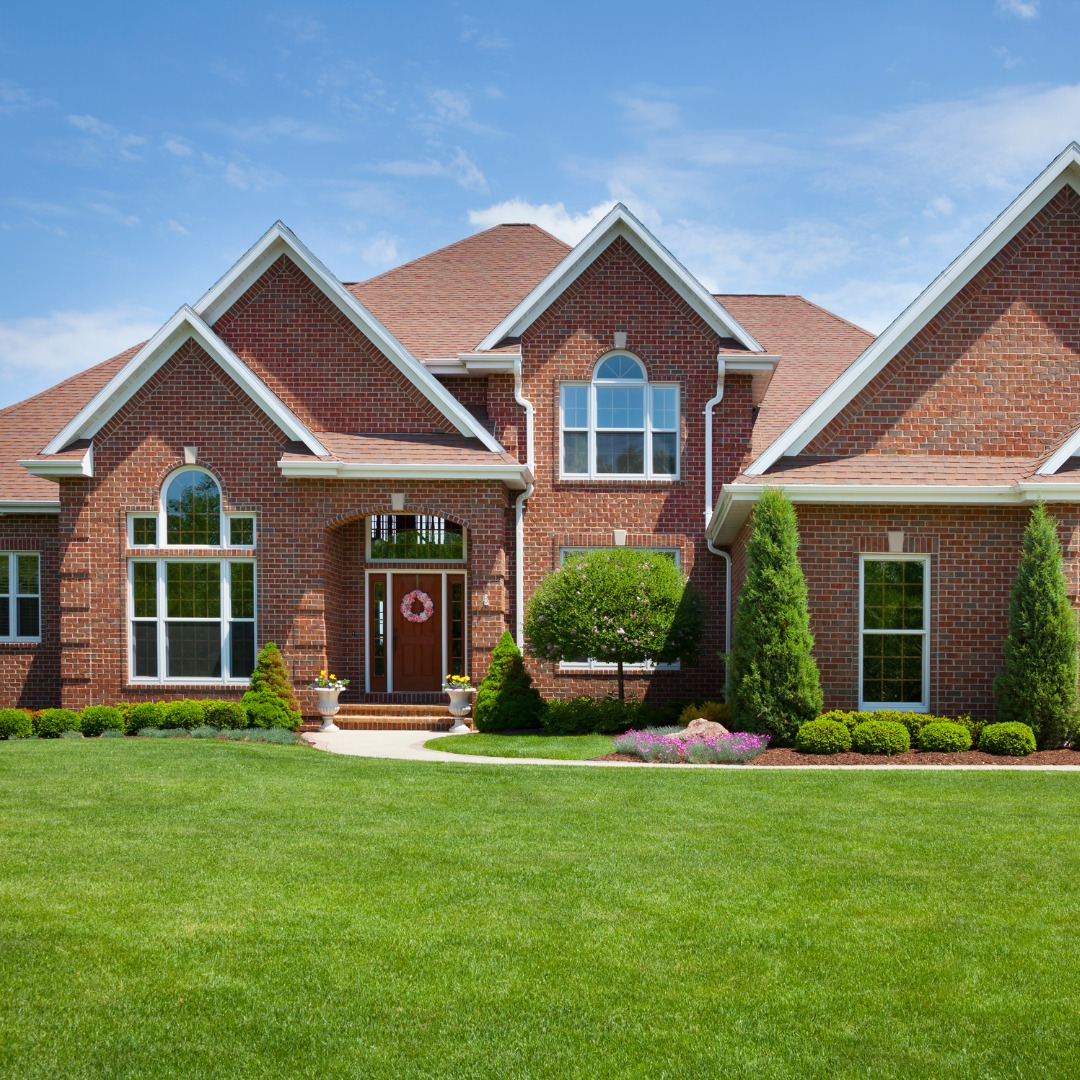 home with healthy green lawn